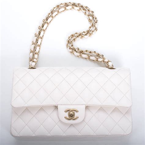 chanel classic white handbag.